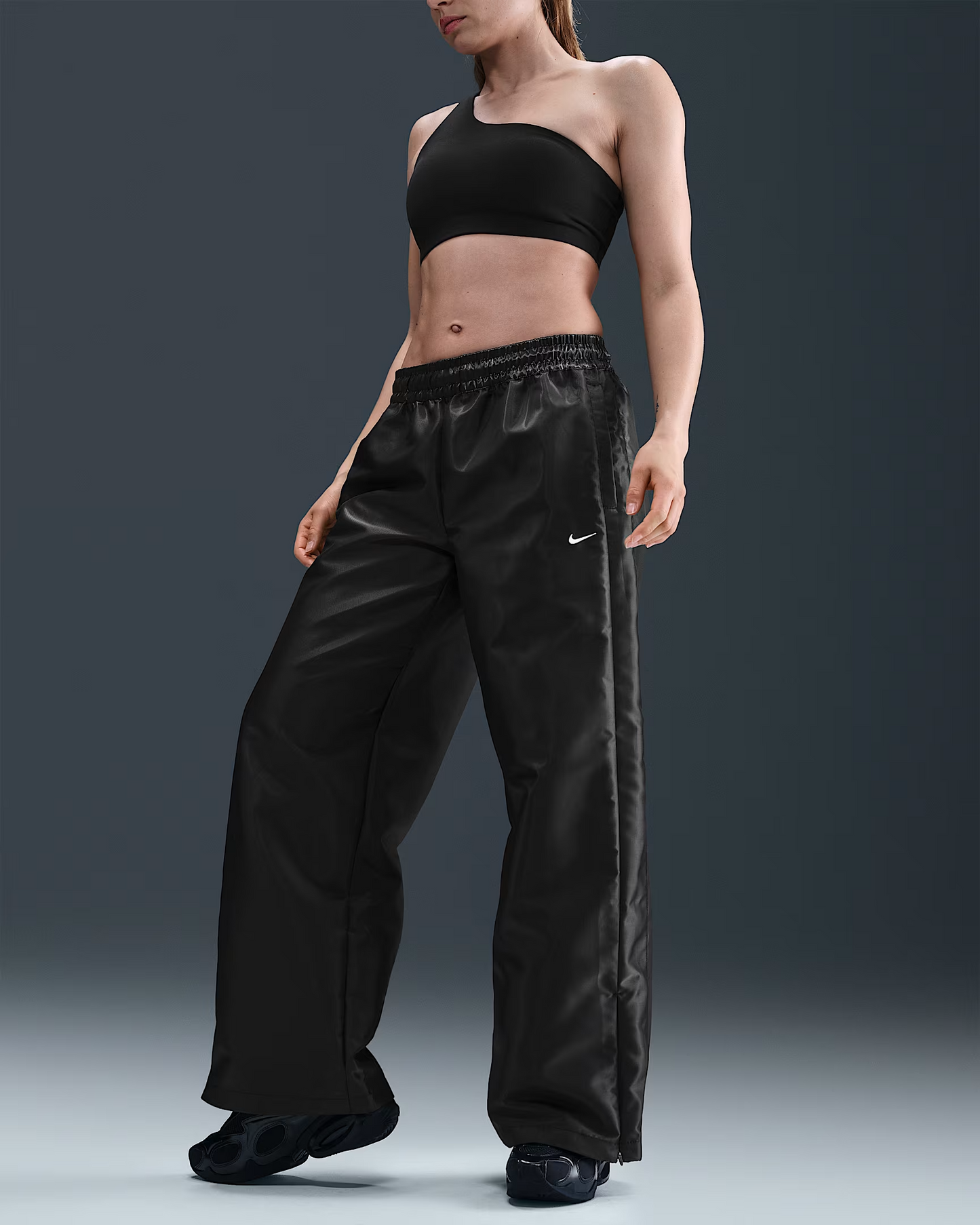 NIKE SPORTSWEAR WINDRUNNER PANTALÓN CON BRILLO