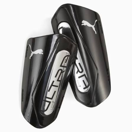ESPINILLERAS CON CORREA DE FÚTBOL PUMA ULTRA LIGERAS BLK HOMBRE