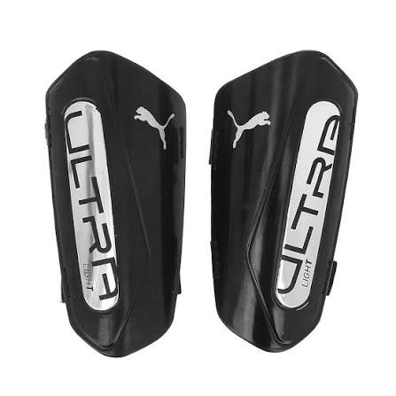 ESPINILLERAS CON CORREA DE FÚTBOL PUMA ULTRA LIGERAS BLK HOMBRE